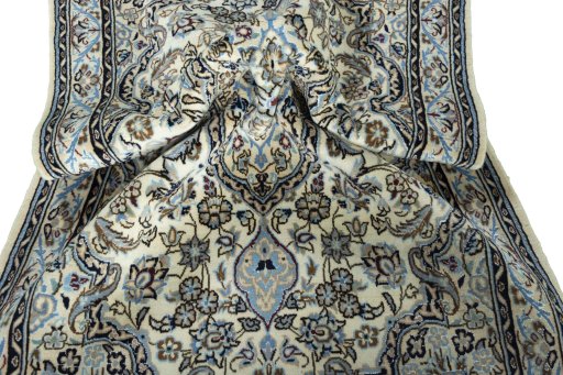 Surface texture of New Nain rug with natural Wool and intricate pattern