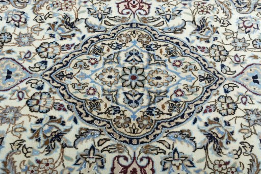 Central medallion detail of New Nain rug from Iran / Persia
