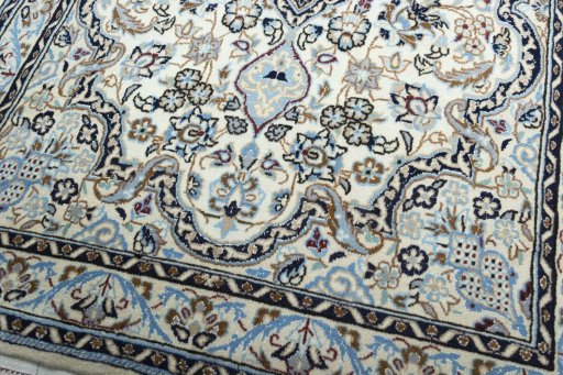Close-up detail of New Nain rug from Iran / Persia showing Wool weave