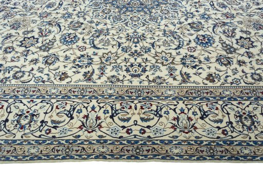 Corner detail of New Nain rug showing border pattern and Wool pile