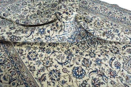 Surface texture of New Nain rug with natural Wool and intricate pattern