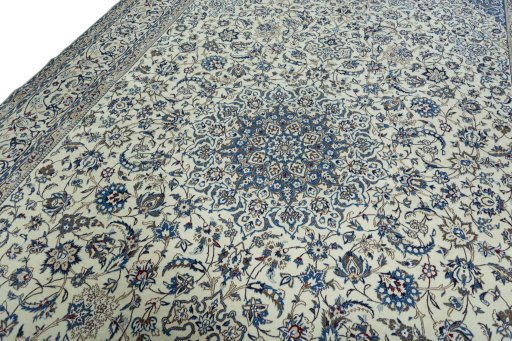 Backside of handmade New Nain rug showing knot structure and weave density