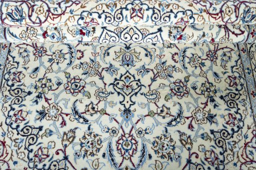 Close-up detail of New Nain rug from Iran / Persia showing Wool weave