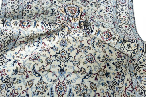 Surface texture of New Nain rug with natural Wool and intricate pattern