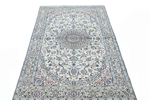 Surface texture of New Nain rug with natural Wool and intricate pattern
