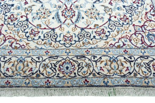 Full view of New Nain rug from Iran / Persia, 243 × 149 cm in Beige tones