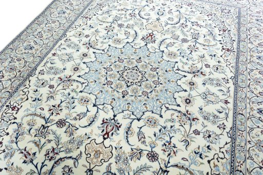 Backside of handmade New Nain rug showing knot structure and weave density