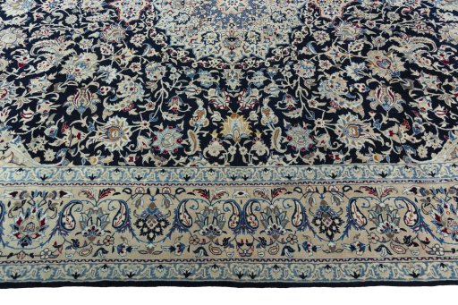 Corner detail of 2000s Nain rug showing border pattern and Wool pile