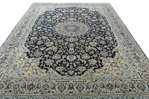 Surface texture of 2000s Nain rug with natural Wool and intricate pattern