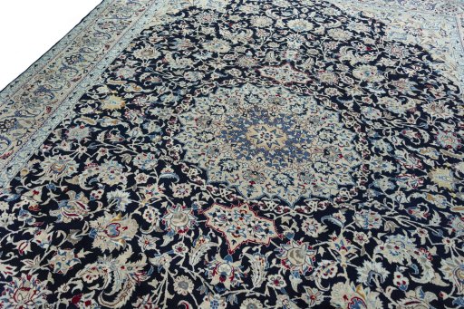 Backside of handmade 2000s Nain rug showing knot structure and weave density
