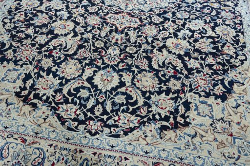 Close-up detail of 2000s Nain rug from Iran / Persia showing Wool weave