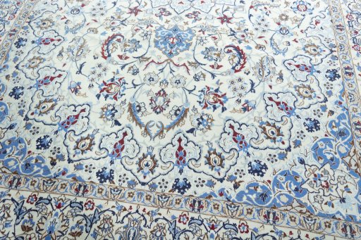 Close-up detail of 2000s Nain rug from Iran / Persia showing Wool weave