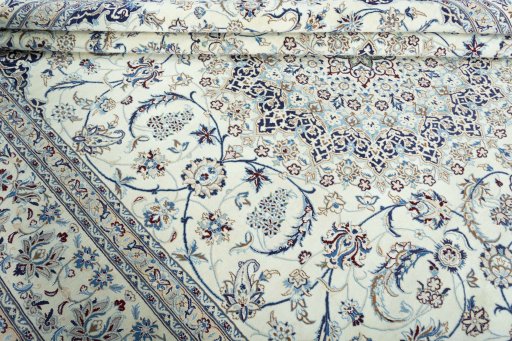 Close-up detail of 2000s Nain rug from Iran / Persia showing Wool weave