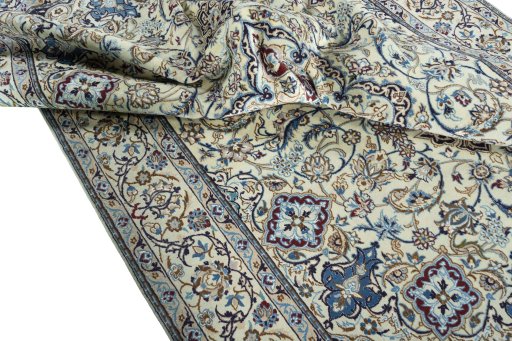 Surface texture of 2000s Nain rug with natural Wool and intricate pattern
