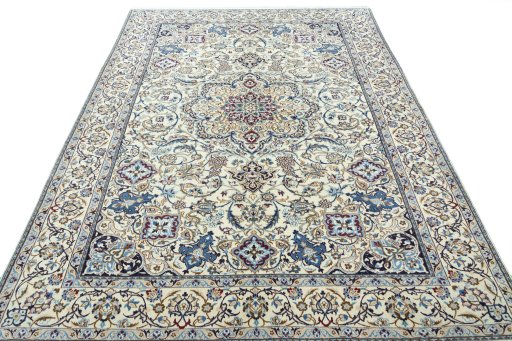 Surface texture of 2000s Nain rug with natural Wool and intricate pattern
