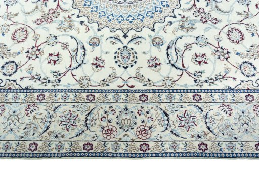 Corner detail of New Nain rug showing border pattern and Wool pile