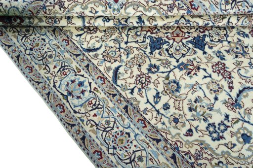 Close-up detail of 2000s Nain rug from Iran / Persia showing Wool weave