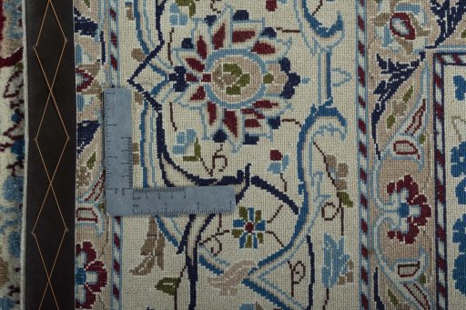 Backside of handmade 2000s Nain rug showing knot structure and weave density