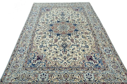 Surface texture of 2000s Nain rug with natural Wool and intricate pattern