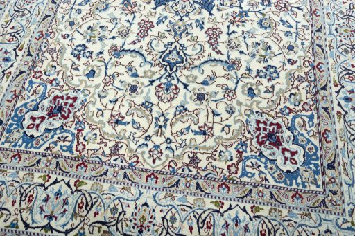 Close-up detail of 2000s Nain rug from Iran / Persia showing Wool weave