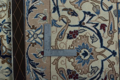 Backside of handmade 2000s Nain rug showing knot structure and weave density