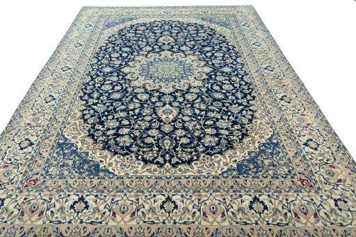 Surface texture of 2000s Nain rug with natural Wool and intricate pattern