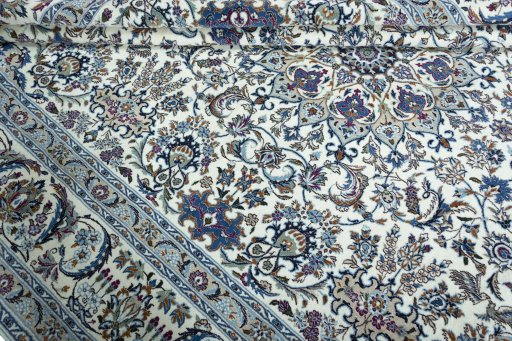 Close-up detail of 2000s Nain rug from Iran / Persia showing Wool weave