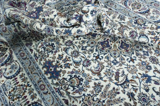 Surface texture of 2000s Nain rug with natural Wool and intricate pattern