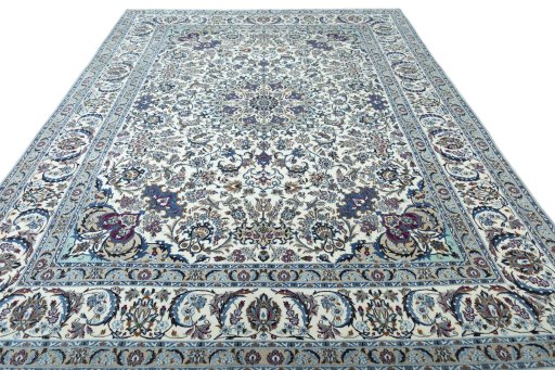 Surface texture of 2000s Nain rug with natural Wool and intricate pattern