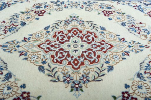 Central medallion detail of 2000s Nain rug from Iran / Persia