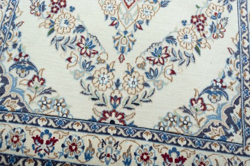Close-up detail of 2000s Nain rug from Iran / Persia showing Wool weave
