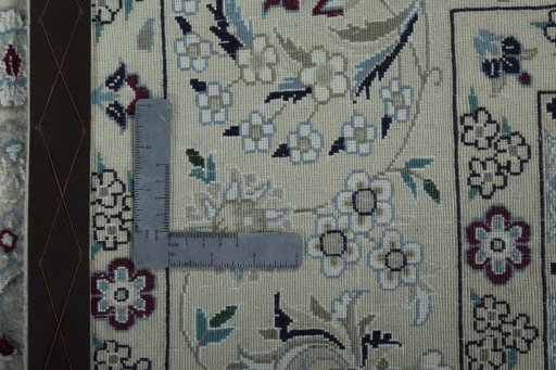 Backside of handmade 2000s Nain rug showing knot structure and weave density