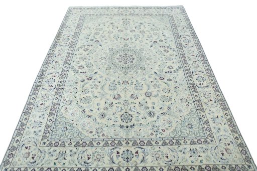 Surface texture of 2000s Nain rug with natural Wool and intricate pattern