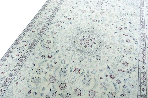Backside of handmade 2000s Nain rug showing knot structure and weave density