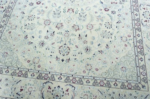 Close-up detail of 2000s Nain rug from Iran / Persia showing Wool weave