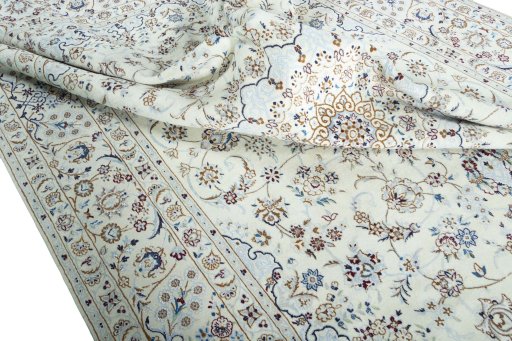 Surface texture of 2000s Nain rug with natural Wool and intricate pattern