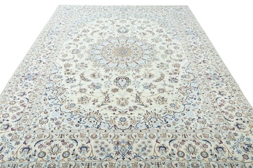 Surface texture of 2000s Nain rug with natural Wool and intricate pattern