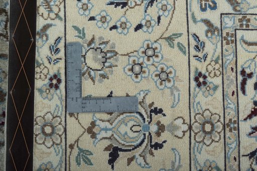 Backside of handmade 2000s Nain rug showing knot structure and weave density