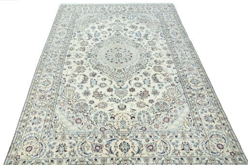 Surface texture of 2000s Nain rug with natural Wool and intricate pattern