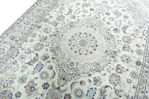 Backside of handmade 2000s Nain rug showing knot structure and weave density