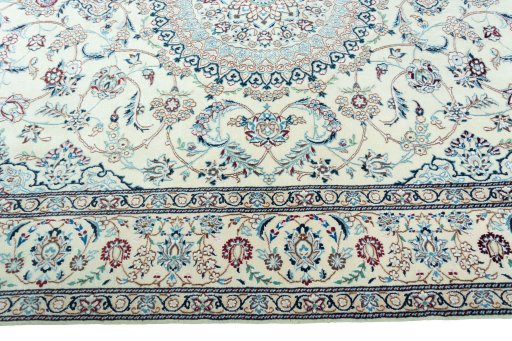 Corner detail of 2000s Nain rug showing border pattern and Wool pile
