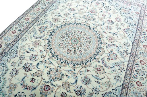 Backside of handmade 2000s Nain rug showing knot structure and weave density