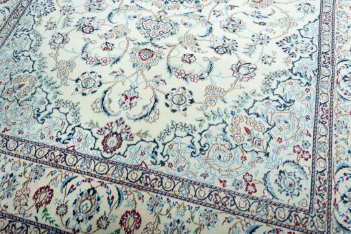 Close-up detail of 2000s Nain rug from Iran / Persia showing Wool weave