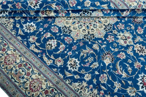 Close-up detail of 2000s Nain rug from Iran / Persia showing Wool weave