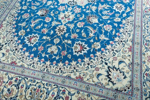 Close-up detail of 2000s Nain rug from Iran / Persia showing Wool weave