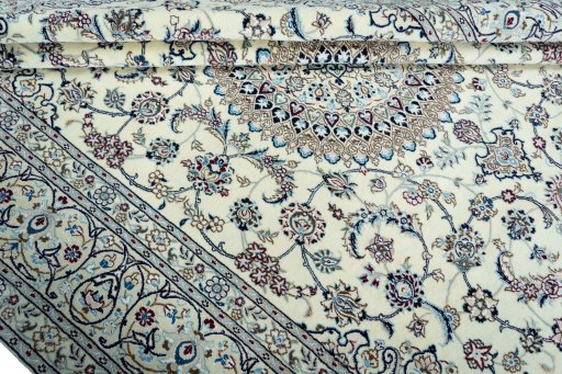 Close-up detail of 2000s Nain rug from Iran / Persia showing Wool weave