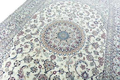 Backside of handmade 2000s Nain rug showing knot structure and weave density