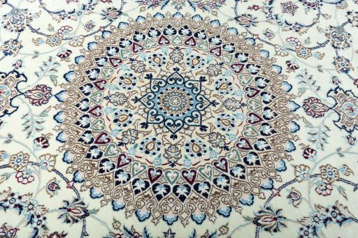 Central medallion detail of 2000s Nain rug from Iran / Persia