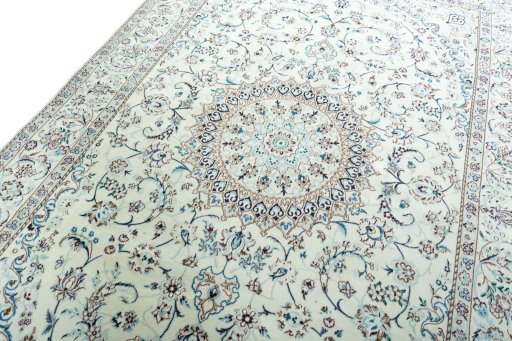 Backside of handmade New Nain rug showing knot structure and weave density
