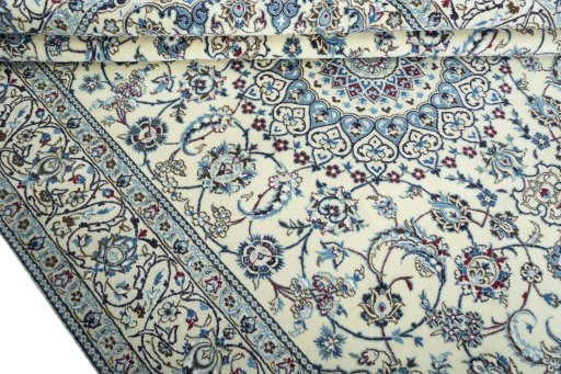 Close-up detail of 2000s Nain rug from Iran / Persia showing Wool weave